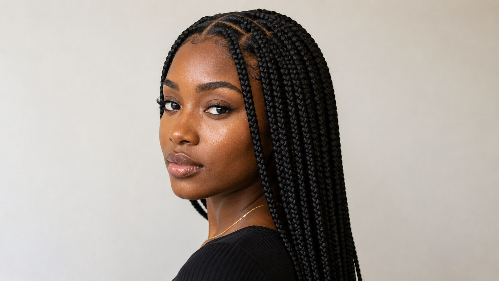 Beautiful African woman with elegant braided hairstyle
